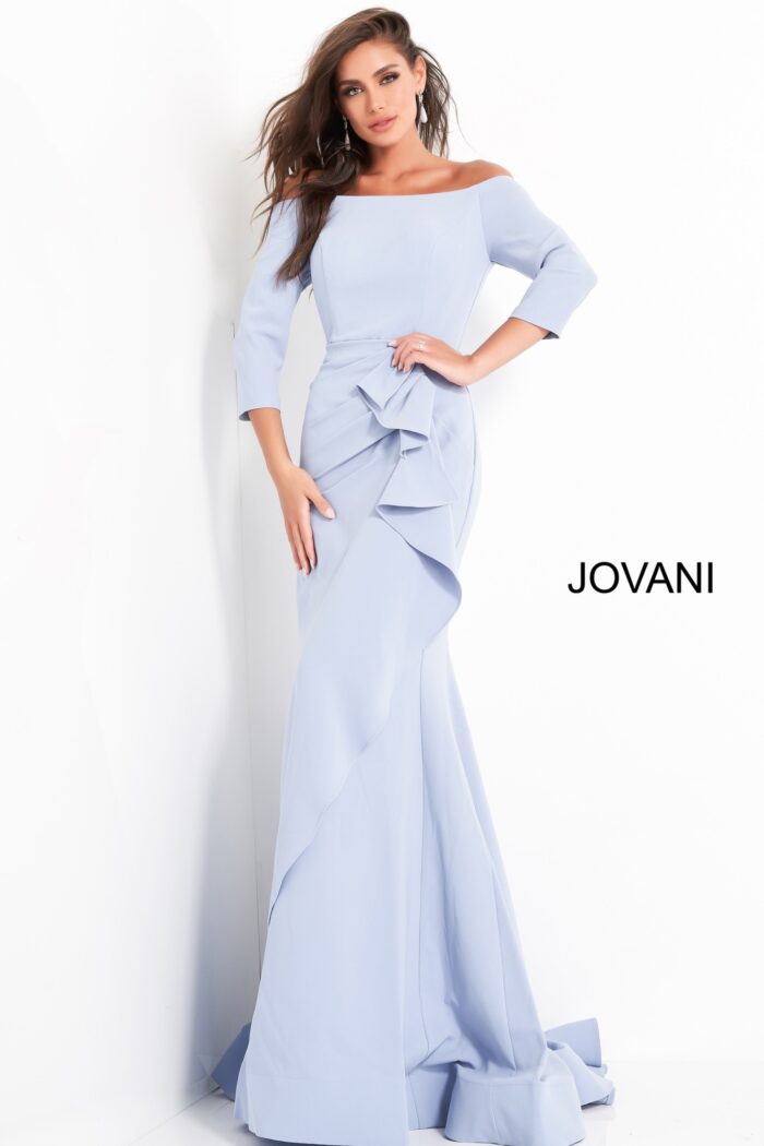 Model showcasing Jovani 00446 light blue mermaid gown with ruffle and off-the-shoulder neckline.