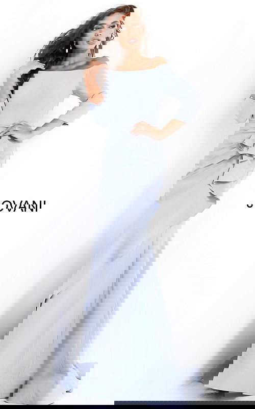 Model wearing Jovani 00446 light blue off-the-shoulder mermaid gown with ruffle detail.