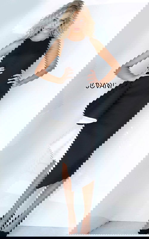 Model wearing Jovani 00572 elegant black dress with ruffle detail.