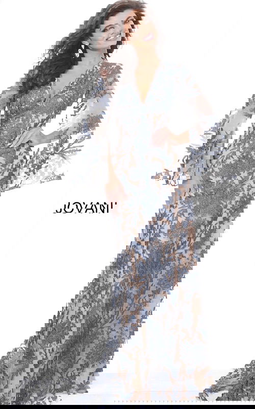 Model wearing Jovani 00752 elegant navy gown with lace detailing and bell sleeves.