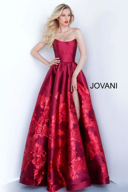 Model wearing Jovani 02038 elegant ball gown with floral embroidery and high slit.