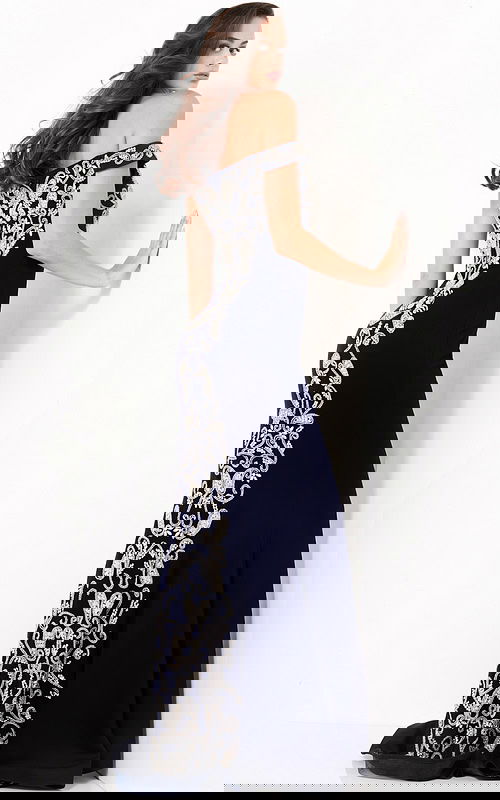 Model wearing Jovani 02576 navy gown, front view showing elegant fit and embroidered details.