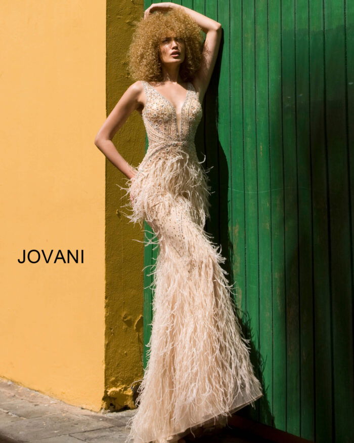 Model wearing Jovani 03023 orange feathered gown with a plunging V-neckline.