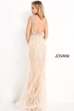 Back view of model in Jovani 03023 blush gown with low scoop back.