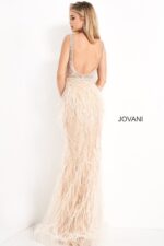 Model in Jovani 03023 blush gown showcasing beaded details.