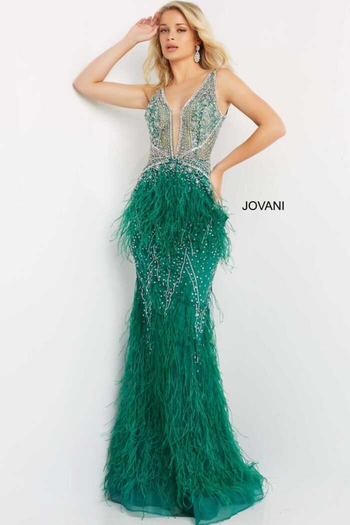 Model wearing Jovani 03023 green gown with deep V-neckline.