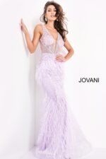 Model showcasing Jovani 03023 lilac dress with intricate bead and feather features.