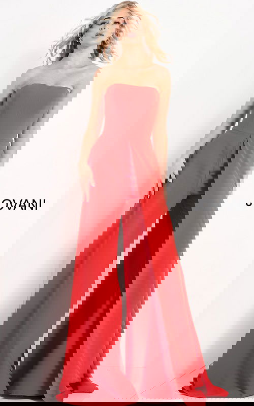 Model wearing Jovani 03529 red jumpsuit, front view, with strapless design and wide-leg silhouette.