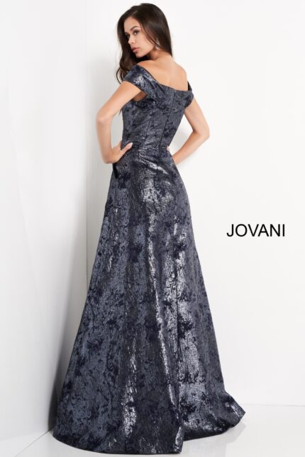 Model wearing Jovani 03674 navy dress with off-the-shoulder neckline, back view