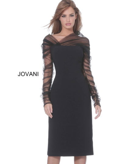 Model wearing Jovani 03810 black midi dress with sheer long sleeves and off-the-shoulder neckline.