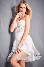 Model wearing Jovani 04109 off-white dress with sweetheart neckline