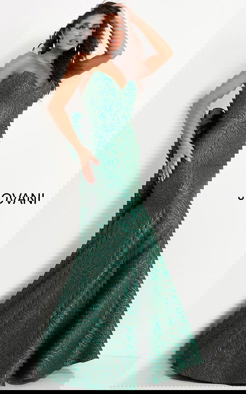 Model wearing Jovani 04158 green gown with mermaid silhouette and sweetheart neckline.