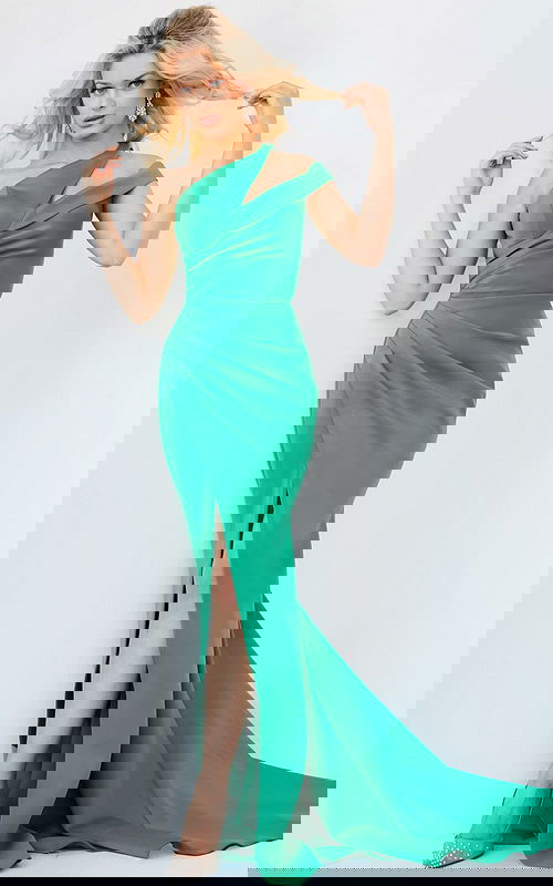 Model wearing Jovani 04222 green dress with one-shoulder neckline and high slit.