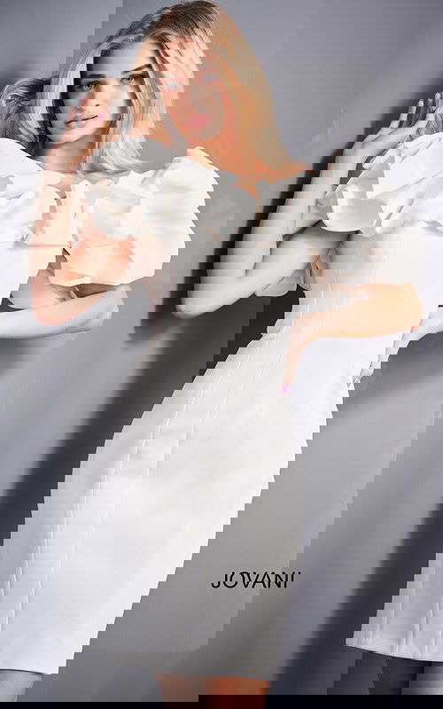 Model wearing Jovani 04367 elegant white dress with off-the-shoulder ruffled neckline, front view.