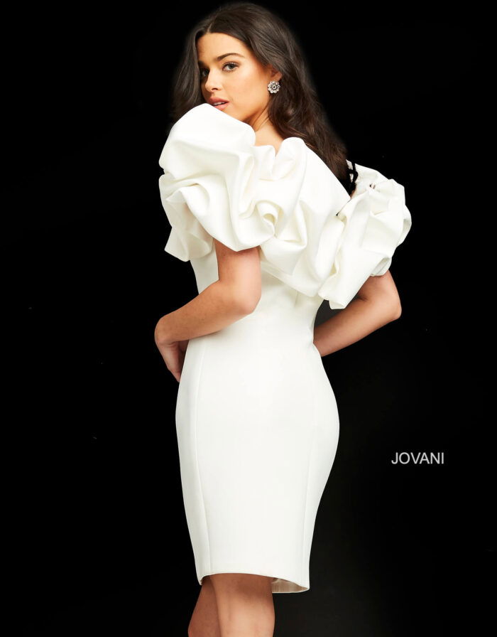 Model wearing Jovani 04367 fitted white dress with ruffled sleeves, back view.