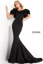 Model wearing Jovani 04368 black mermaid gown with ruffled sleeves, front view.