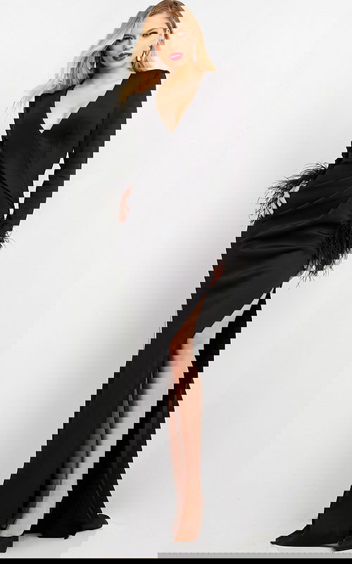 Model wearing Jovani 04501 black gown with high slit.