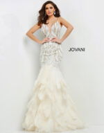 Model wearing Jovani 04625 off-white mermaid gown with V-neckline.