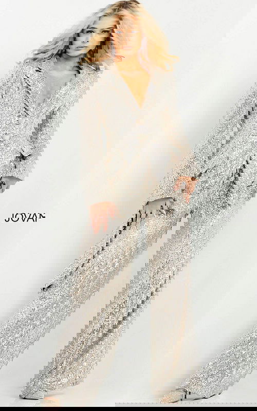 Model wearing Jovani 04905 nude sequin blazer-style jumpsuit from the front.