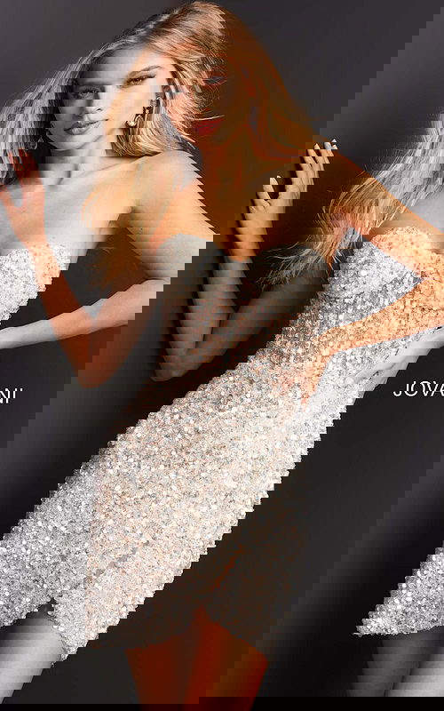 Model wearing Jovani 04914 nude sequin cocktail dress with sweetheart neckline, front view.