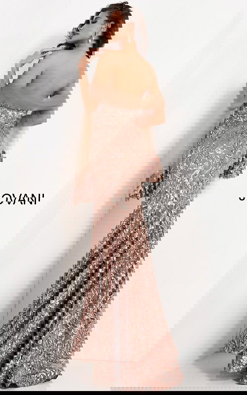 Back view of model in Jovani 05054 mermaid gown with elegant sequin embellishments.