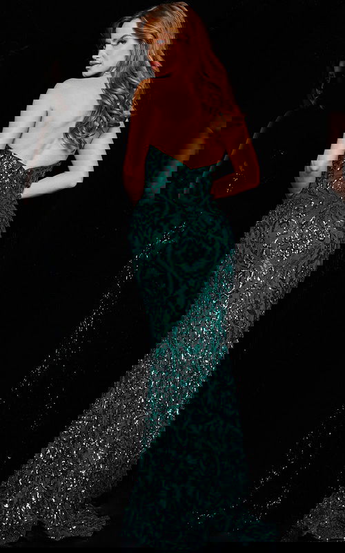 Model wearing Jovani 05054 in green, rear view with sequin details.