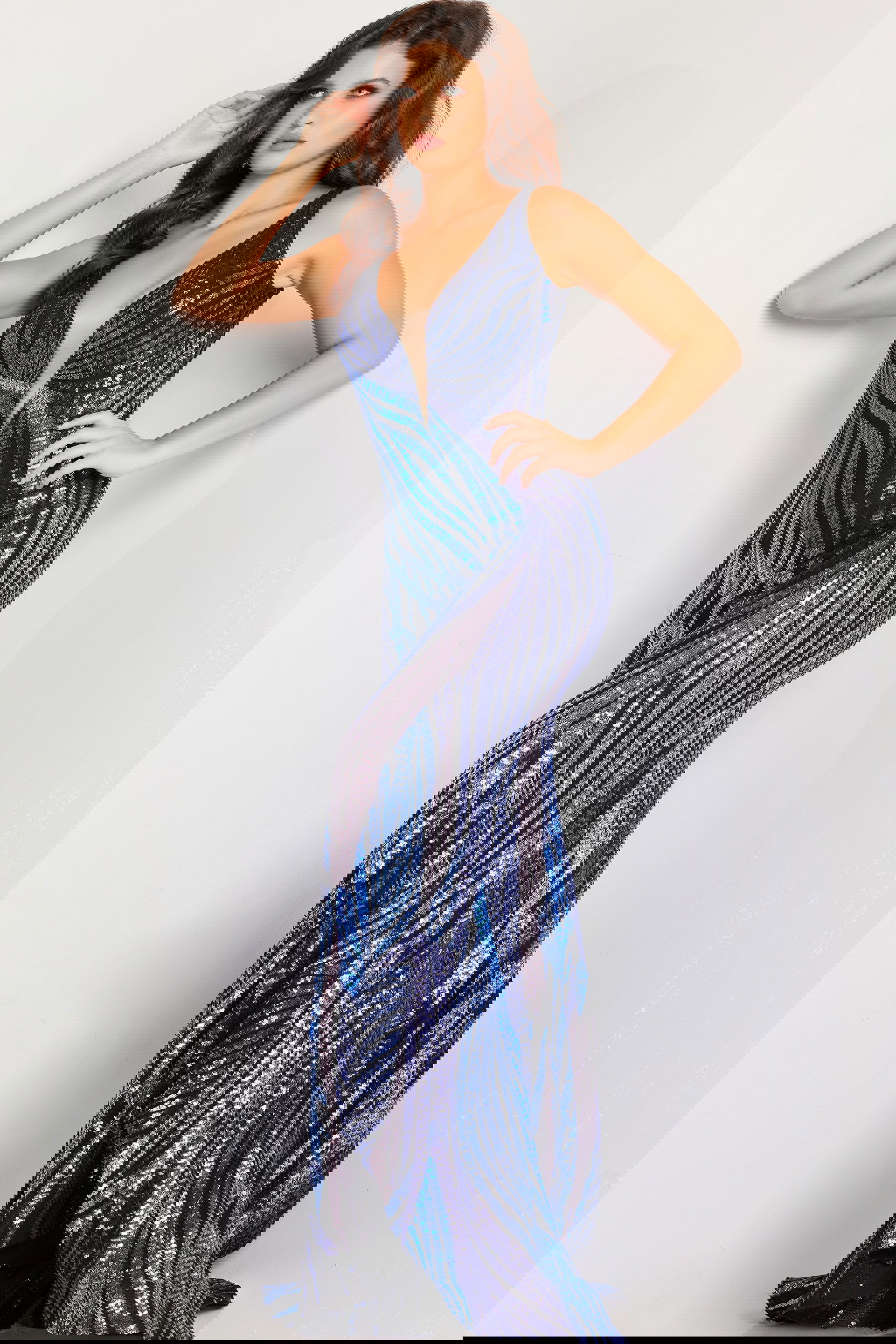 05103_1.jpg Model wearing Jovani 05103 dress with deep V neckline in blue, frontal view.