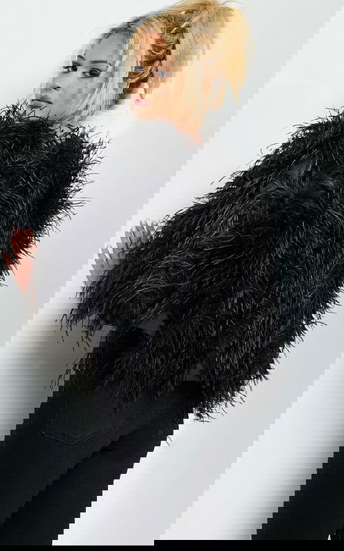 Back view of Jovani 05257 black dress on a model.