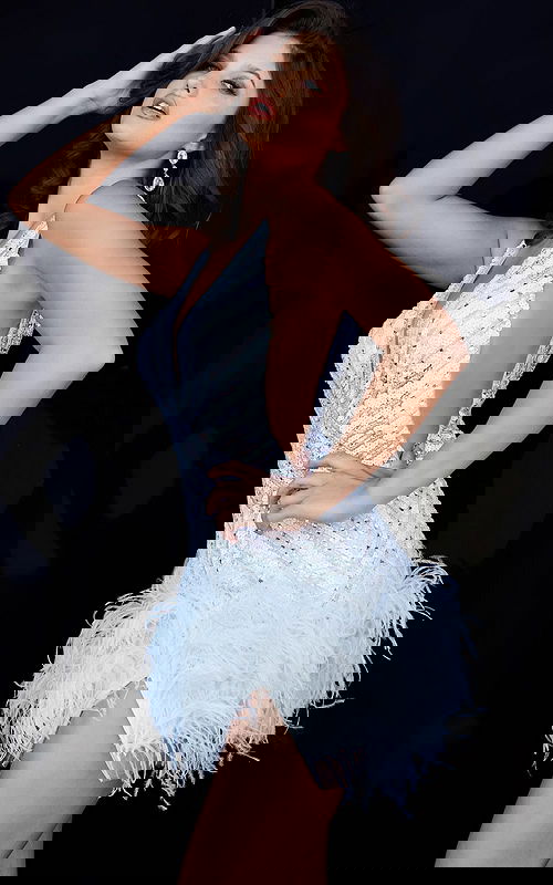 Front view of Jovani 05535 white dress with sequins and feathers.