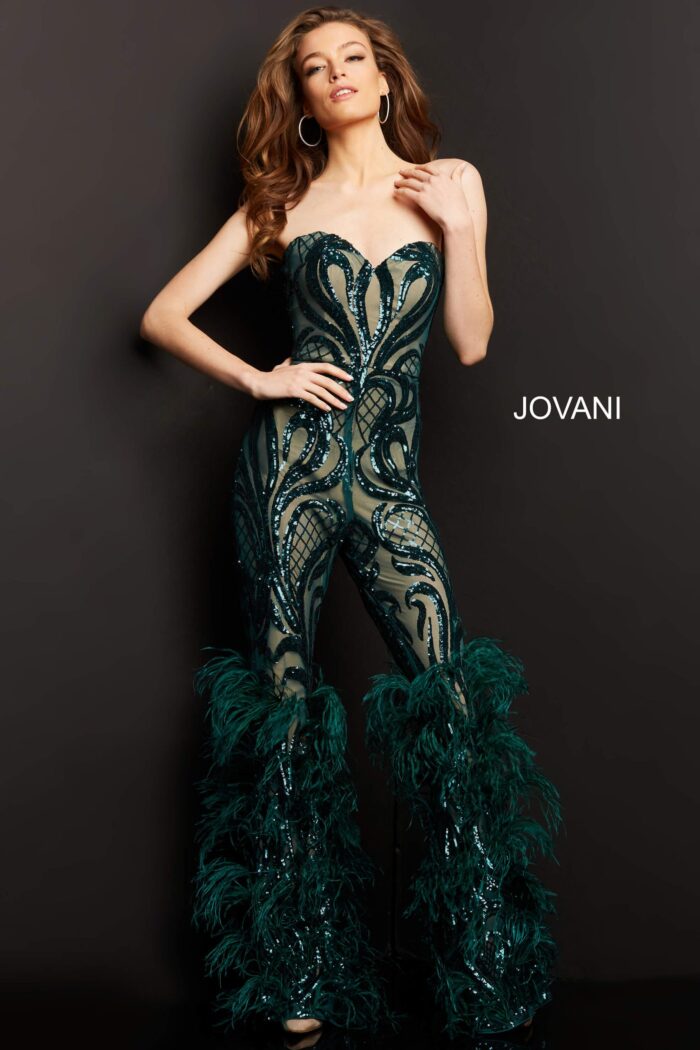 model wearing Jovani 05669 green jumpsuit with feather detail from front