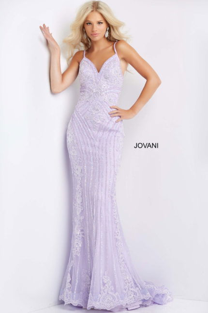 Model wearing Jovani 05752 lilac gown with V-neckline and embellishments.