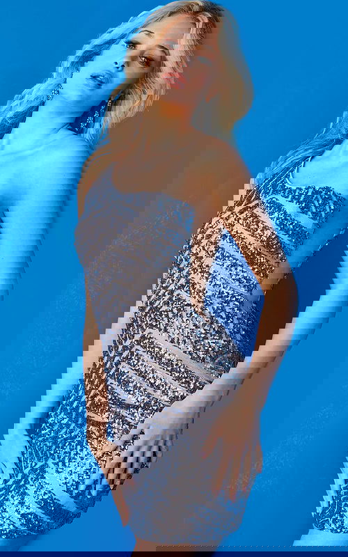 Model wearing Jovani 06016 gray sequin short dress with one-shoulder neckline.