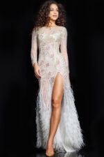 Model wearing Jovani 06344 in front view showcasing long sheer sleeves and beading.