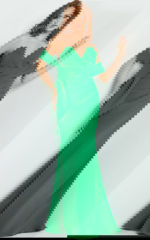 Model wearing Jovani 06403 emerald green gown with off-the-shoulder neckline.