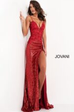Model wearing Jovani 06426 red gown with high slit and floral bodice, full-length view.