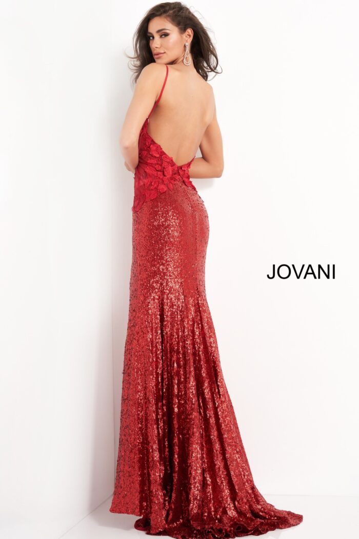 Model wearing Jovani 06426 red gown, back view highlighting floral details.