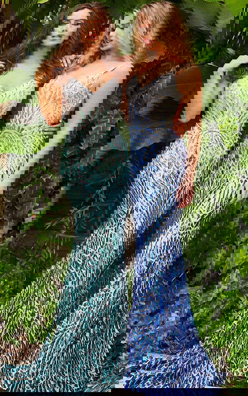 Two models wearing Jovani 06450 dress with silver and detailed patterns.