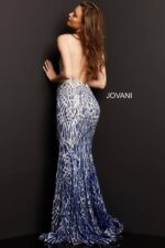 Model posing in Jovani 06450 silver gown back view