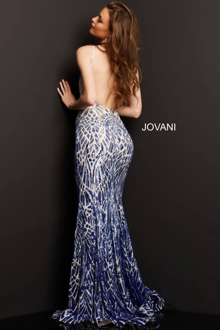 Model posing in Jovani 06450 silver gown back view