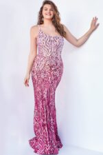 Model wearing Jovani 06469 pink floor-length gown with beadwork, front view.
