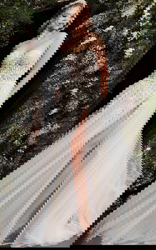 Front view of Jovani 06610 white gown with floral embroidery and high slit.