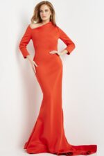 Model wearing Jovani 06614 orange gown with long sleeves, front view
