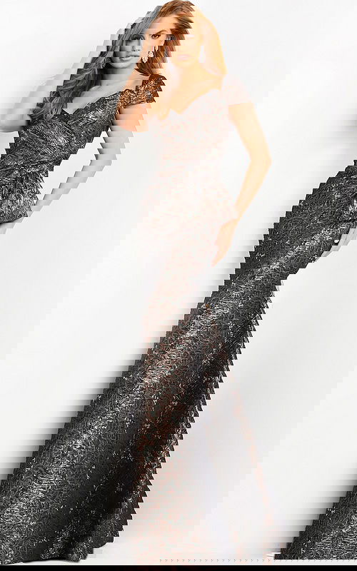 Model wearing Jovani 06707 bronze mermaid gown with sweetheart neckline and short sleeves.