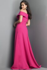 Model wearing Jovani 06746 fuchsia gown with off-the-shoulder neckline, back view.