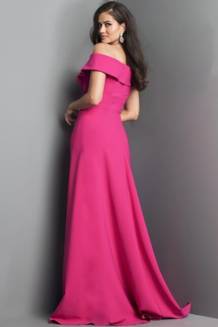 Model wearing Jovani 06746 fuchsia gown with off-the-shoulder neckline, back view.