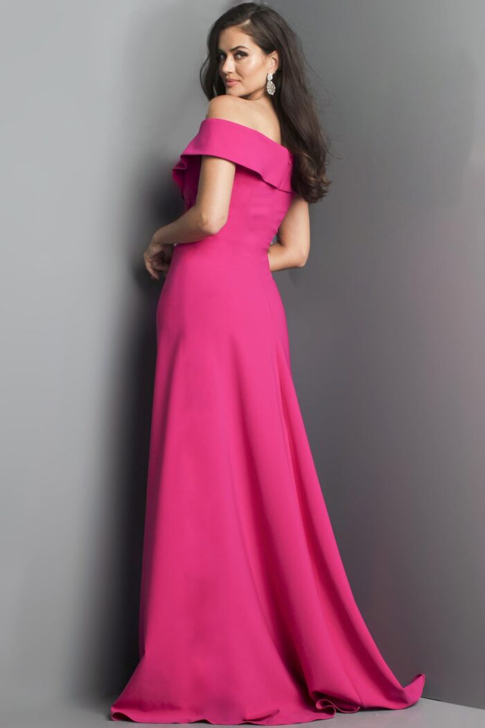 Model wearing Jovani 06746 fuchsia gown with off-the-shoulder neckline, back view.