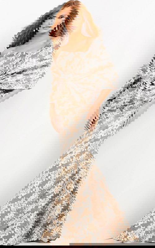 Model wearing Jovani 06760 beige mermaid dress with off-the-shoulder neckline.