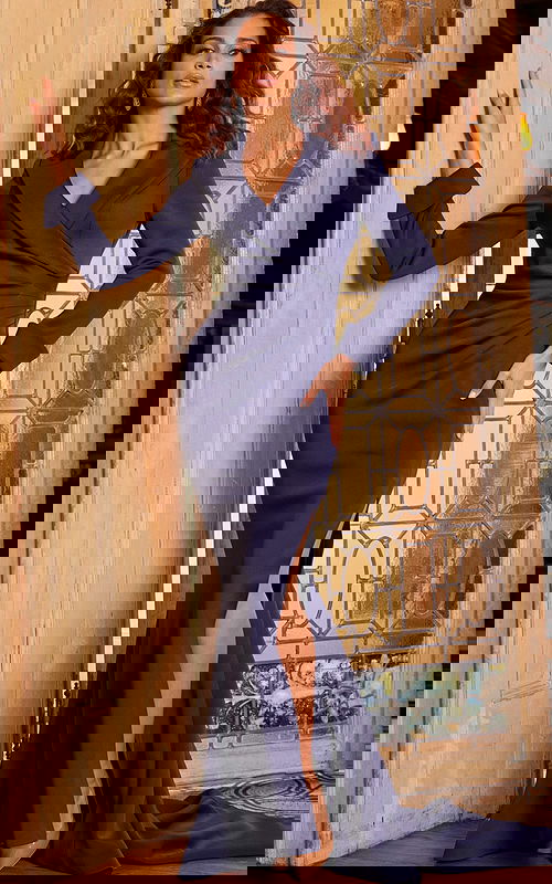 Model wearing Jovani 06774 navy dress, front view