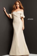 Model in Jovani 06831 beige dress, showcasing sophisticated design with elegant silhouette.