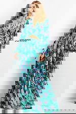 model wearing Jovani 06844, 07202 Print dress with V-neck and long sleeves front view